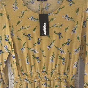 Cute yellow with purple flowers dress $10